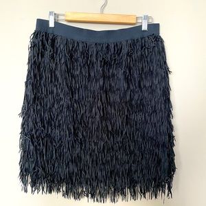 Black fringe mini skirt